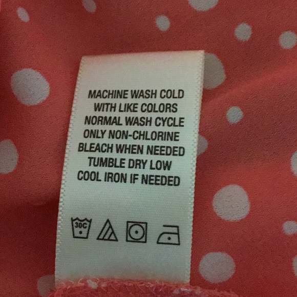 Coral colored white polka-dotted blouse with button front and tie closure. - Picture 5 of 5